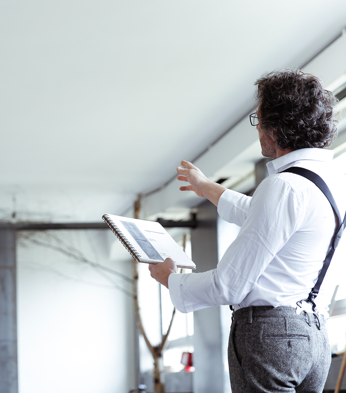 restoration contractor documenting mold water damage insurance claim