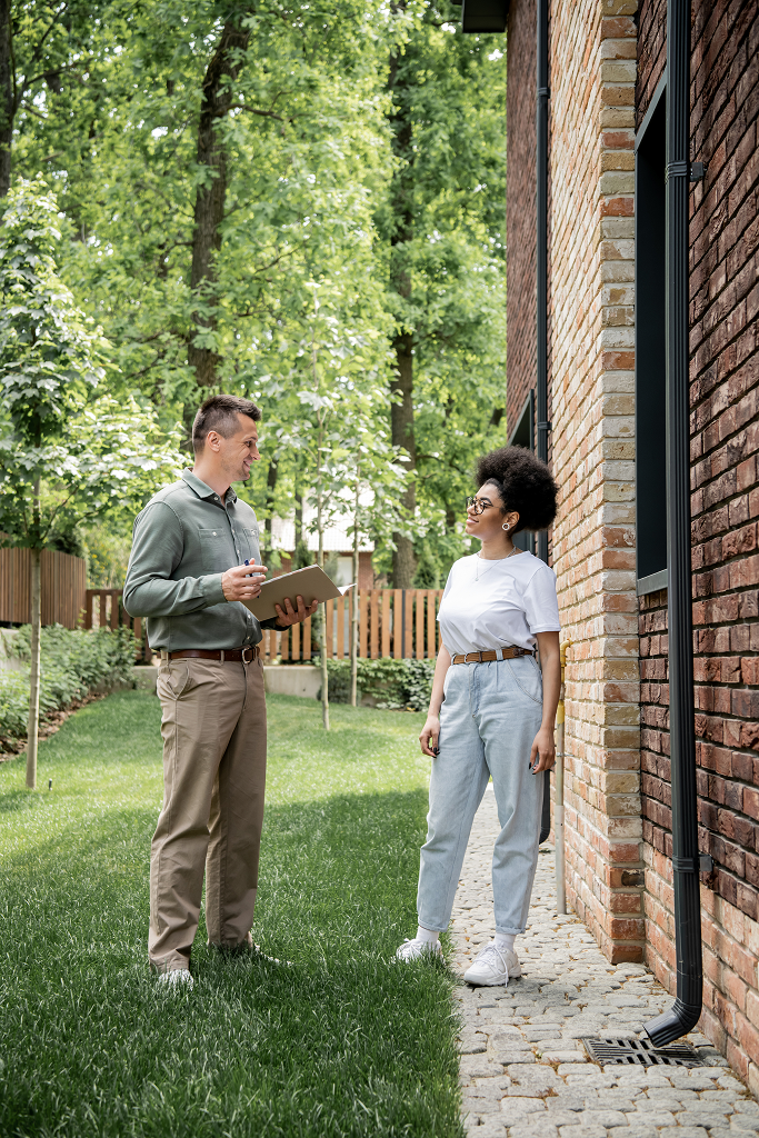 property damage restoration inspection with homeowner